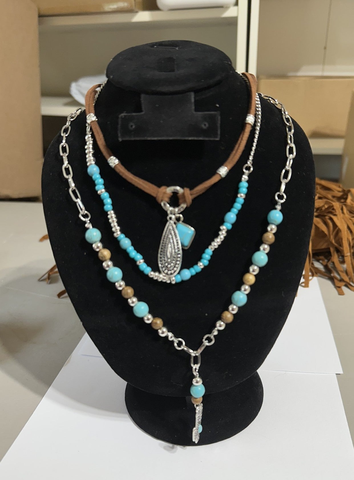 Turquoise, leather, and silver three stage necklace